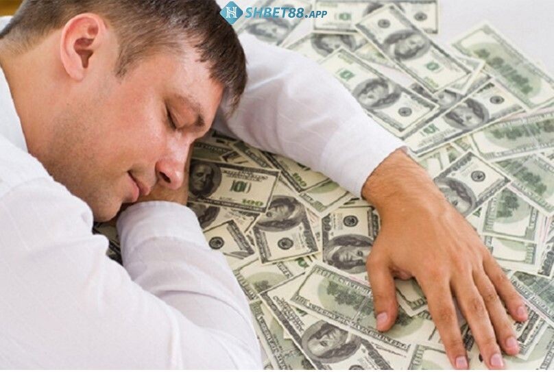 Mơ thấy tiền có phát tài không? Giải mã giấc mơ cùng Shbet 12 Đàn ông mơ thấy túi tiền đầy ắp